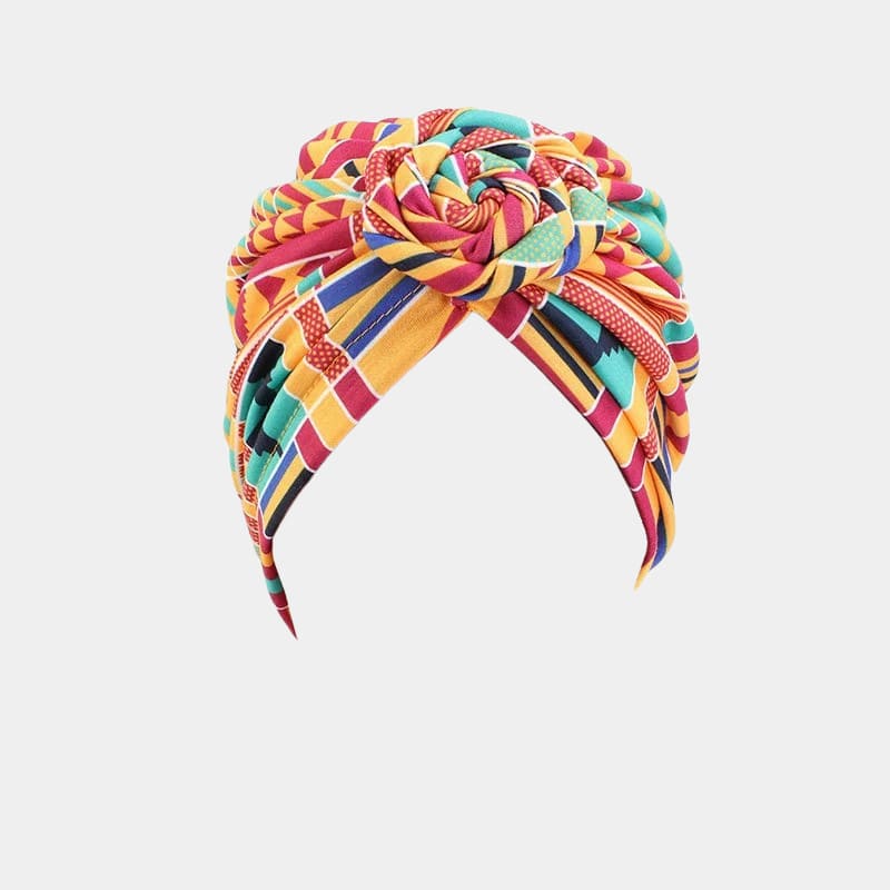 Turban motif africain orange avec nœud