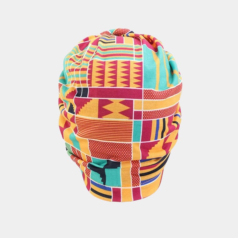 Turban motif africain orange avec nœud